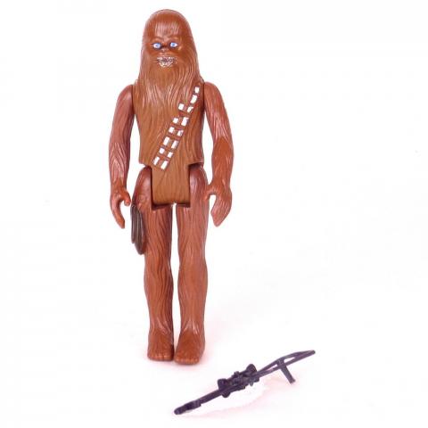 Star Wars - jeux, jouets, figurines -  - Star Wars - Kenner - 1977 - figurine Chewbacca avec son arme - 80086